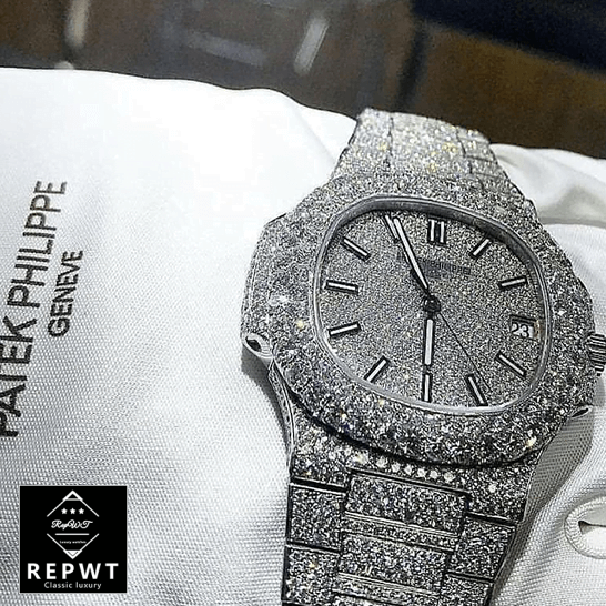 patek_philippe_nautilus_jumbo_white_dial_5719_10G_010_iced_out_replica_hand_two-1