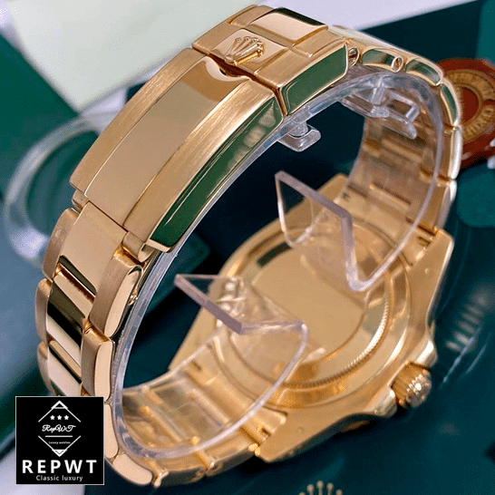 rolex_GMT_Master_II_116718LN_gold_watch_black_dial_oyster_replica_clips-1